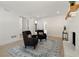 Bright living room featuring hardwood floors, neutral walls, fireplace and two modern armchairs at 220 Hobnail Se Ct, Marietta, GA 30067
