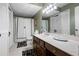 Bathroom with decorative mirrors and a large vanity at 3727 Cline Se Dr, Smyrna, GA 30082
