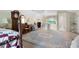 Bright bedroom featuring a reading nook and adjacent bathroom at 3727 Cline Se Dr, Smyrna, GA 30082