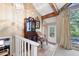 Bright foyer featuring tile floor, high ceiling, and decorative mirror and seating at 3727 Cline Se Dr, Smyrna, GA 30082