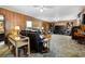 Expansive living room with wood paneling and plush furnishings at 3727 Cline Se Dr, Smyrna, GA 30082