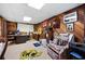 Office with wood paneling, memorabilia, and comfortable seating area at 3727 Cline Se Dr, Smyrna, GA 30082