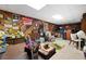 Unique office space with wood paneling and decorated with memorabilia at 3727 Cline Se Dr, Smyrna, GA 30082