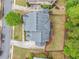 An aerial view of the house showcases the roof, driveway, and well-maintained landscaping at 626 Oakbourne Way, Woodstock, GA 30188