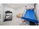 Basement area with an air basketball game and treadmill at 626 Oakbourne Way, Woodstock, GA 30188