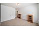 Bright bedroom with neutral carpet, two display cabinets, and white trim at 626 Oakbourne Way, Woodstock, GA 30188