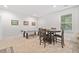 Large game room featuring a billiards table and a round game table, perfect for entertaining guests at 626 Oakbourne Way, Woodstock, GA 30188