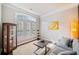 Cozy living room with large window, stylish decor, and comfortable seating at 626 Oakbourne Way, Woodstock, GA 30188