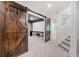 Home theater room with sliding barn doors at 626 Oakbourne Way, Woodstock, GA 30188