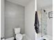 Stylish bathroom with a modern toilet and a walk-in shower at 1923 Prospect Park Ln, Decatur, GA 30033