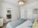 Bright bedroom view highlighting bathroom access and natural light at 1923 Prospect Park Ln, Decatur, GA 30033
