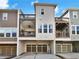 Modern townhome with private balconies, garage parking, and contemporary design at 1923 Prospect Park Ln, Decatur, GA 30033