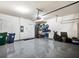 Spacious two-car garage with epoxy flooring and ample storage space for vehicles and equipment at 1923 Prospect Park Ln, Decatur, GA 30033