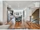 Open concept living space with modern kitchen and staircase at 1923 Prospect Park Ln, Decatur, GA 30033