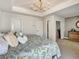 Serene main bedroom features a tray ceiling and two closets at 1923 Prospect Park Ln, Decatur, GA 30033