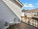 Cozy patio featuring two comfortable chairs and side table with view of neighboring units at 1923 Prospect Park Ln, Decatur, GA 30033