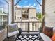 Cozy porch with outdoor seating and decorative pillows at 1923 Prospect Park Ln, Decatur, GA 30033