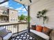 Relaxing porch with comfortable seating, plants, and a ceiling fan at 1923 Prospect Park Ln, Decatur, GA 30033
