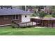 View of the home's wooden deck and fenced yard that create a private outdoor space at 223 Lucerne St, Decatur, GA 30030