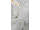 Modern bathroom features a white vanity, gold fixtures, and a beautifully tiled shower area at 584 Indian Hills Pkwy, Marietta, GA 30068