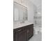Bathroom with marble style shower and sink at 584 Indian Hills Pkwy, Marietta, GA 30068