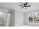 Bedroom features light-colored walls and trim, with an attached bathroom at 584 Indian Hills Pkwy, Marietta, GA 30068