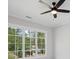 Bright bedroom with large windows overlooking the yard at 584 Indian Hills Pkwy, Marietta, GA 30068