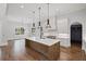 Gourmet kitchen featuring a central island, stainless steel appliances, and custom cabinets at 584 Indian Hills Pkwy, Marietta, GA 30068