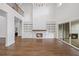 Open floor plan living room features fireplace, built-ins, and sliding glass doors at 584 Indian Hills Pkwy, Marietta, GA 30068