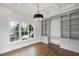 Office with custom built-ins, recessed lighting, coffered ceilings, and modern chandelier at 584 Indian Hills Pkwy, Marietta, GA 30068
