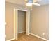 Neutral bedroom featuring a closet and a ceiling fan with light fixture at 1975 Hoods Fort Nw Cir # 24, Kennesaw, GA 30144