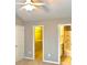 Neutral bedroom offers an ensuite bathroom with shower and walk-in closet at 1975 Hoods Fort Nw Cir # 24, Kennesaw, GA 30144