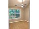 Bedroom with neutral walls, carpet, a ceiling fan and window with privacy blinds at 1975 Hoods Fort Nw Cir # 24, Kennesaw, GA 30144