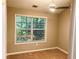 Bedroom with neutral walls, carpet, a ceiling fan and window with privacy blinds at 1975 Hoods Fort Nw Cir # 24, Kennesaw, GA 30144