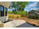 The private backyard has a lawn, patio, new plantings, and privacy fence at 3040 Greenfield Dr, Marietta, GA 30068