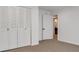 The bedroom features a closet with paneled doors and natural light at 3040 Greenfield Dr, Marietta, GA 30068