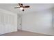 Neutral bedroom with light-colored walls and carpeting, large closet, and neutral trim at 3040 Greenfield Dr, Marietta, GA 30068