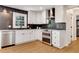 Modern kitchen featuring stainless steel appliances, subway tile backsplash, and ample counter space at 3040 Greenfield Dr, Marietta, GA 30068