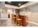 Finished basement with bar including a sink, storage, and seating at 629 Gold Valley Pass, Canton, GA 30114