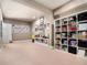 Basement with carpet and built-in shelving at 629 Gold Valley Pass, Canton, GA 30114