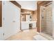 Bathroom with a standing shower, vanity, tile flooring, and a closet at 629 Gold Valley Pass, Canton, GA 30114
