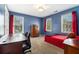 Bedroom featuring neutral carpet, a large window, and a work space area at 629 Gold Valley Pass, Canton, GA 30114