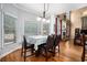 Well-lit breakfast nook connecting to the living room with a view of the outside, enhancing the dining experience at 629 Gold Valley Pass, Canton, GA 30114