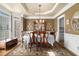 Elegant dining room featuring a chandelier, neutral paint and lots of natural light at 629 Gold Valley Pass, Canton, GA 30114