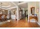 Formal dining room featuring hardwood floors and chandelier lighting and wainscotting at 629 Gold Valley Pass, Canton, GA 30114