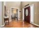 Inviting foyer with gleaming hardwood floors and a beautiful stained-glass front door at 629 Gold Valley Pass, Canton, GA 30114