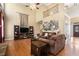 Expansive living room featuring hardwood floors, large windows, and a gallery wall, perfect for Gathering gatherings at 629 Gold Valley Pass, Canton, GA 30114