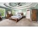 Serene main bedroom featuring a comfortable bed, warm lighting, and ample closet space, perfect for restful nights at 629 Gold Valley Pass, Canton, GA 30114