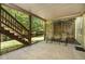 Covered patio with seating offering shade and a place to enjoy the surrounding nature at 629 Gold Valley Pass, Canton, GA 30114