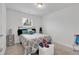 Well-lit bedroom with a playful decor and a cozy carpet at 7545 Roseberry Way, Lithonia, GA 30038